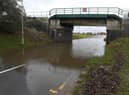 Flood water under the railway bridge on Boston Road, Sleaford. EMN-210120-174633001