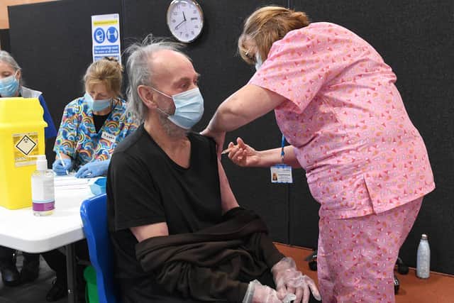 Administering the vaccine in the hub in Boston