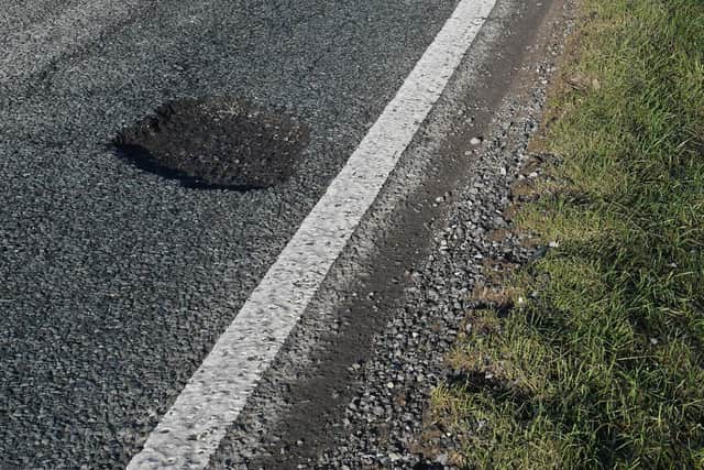 Potholes on the A15 just south of Ashby de la Launde turning. EMN-210122-124122001