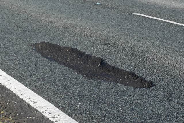 Potholes on the A15 just south of Ashby de la Launde turning. EMN-210122-124100001
