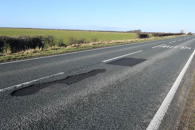 Potholes on the A15 just south of Ashby de la Launde turning. EMN-210122-124111001
