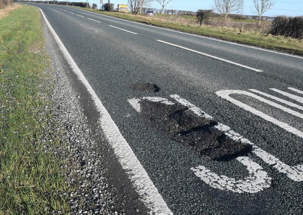Potholes on the A15 just south of Ashby de la Launde turning. EMN-210122-124038001