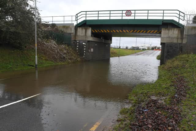 Flood water under the railway bridge on Boston Road, Sleaford. EMN-210128-174013001