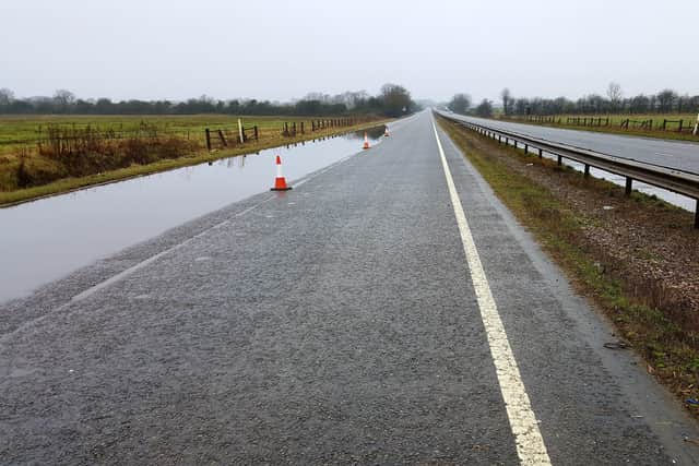 A lane blocked off westbound on the A17 towards Holdingham roundabout due to flooding. Photo: Graham Potter EMN-210128-174227001