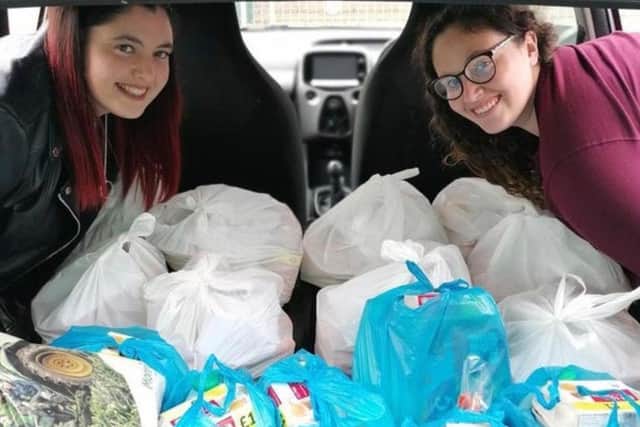 Volunteers Megan, 26 and Grace Cox, 21, have been delivering free meals to homeschoolers.