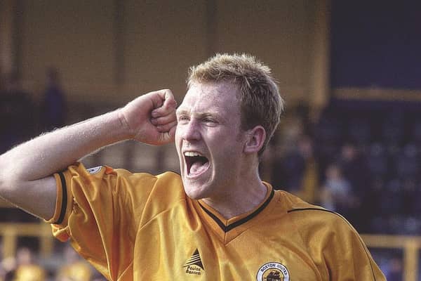 Simon Rusk celebrates at full time.