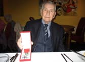 Jeff Palmer with his award.