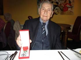 Jeff Palmer with his award.