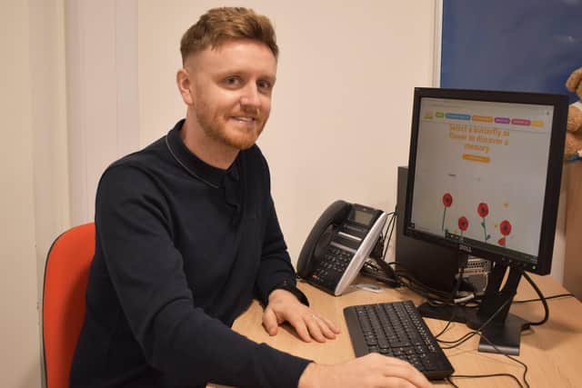 Lindsey Lodge Senior Manager Tom Moody pictured with the Remember Me Garden EMN-210202-153541001