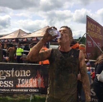 Andrew has always kept himself fit, here enjoying a mud run. EMN-210302-101420001