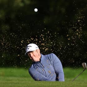 Dave Coupland plays out of the green side bunker on the fifth hole during the Dubai Duty Free Irish Open at Galgorm Spa & Golf Resort. (Photo by Richard Heathcote/Getty Images)