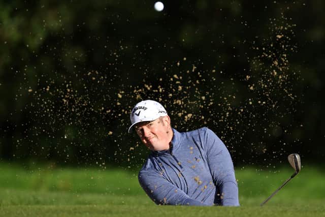 Dave Coupland plays out of the green side bunker on the fifth hole during the Dubai Duty Free Irish Open at Galgorm Spa & Golf Resort. (Photo by Richard Heathcote/Getty Images)