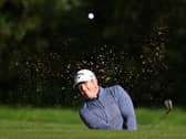 Dave Coupland plays out of the green side bunker on the fifth hole during the Dubai Duty Free Irish Open at Galgorm Spa & Golf Resort. (Photo by Richard Heathcote/Getty Images)