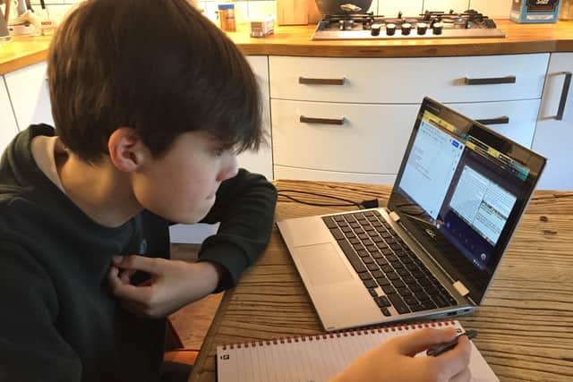 Year 8 student Felix Nichol takes part in remote learning from home.