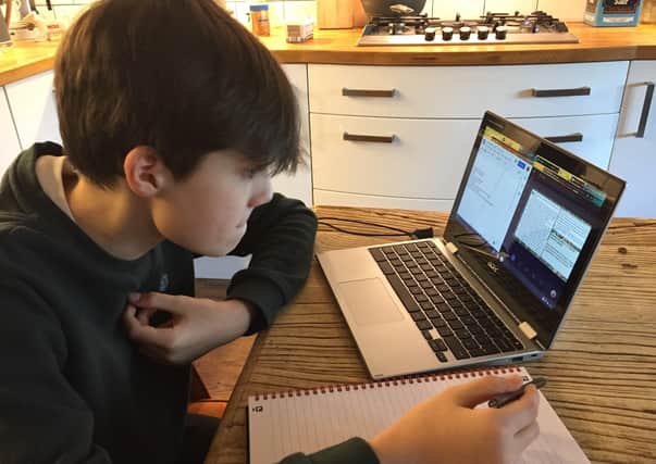 Year 8 student Felix Nichol takes part in remote learning from home.