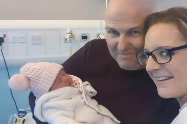 Darren Flanagan and his partner Sheridan with baby Layla.