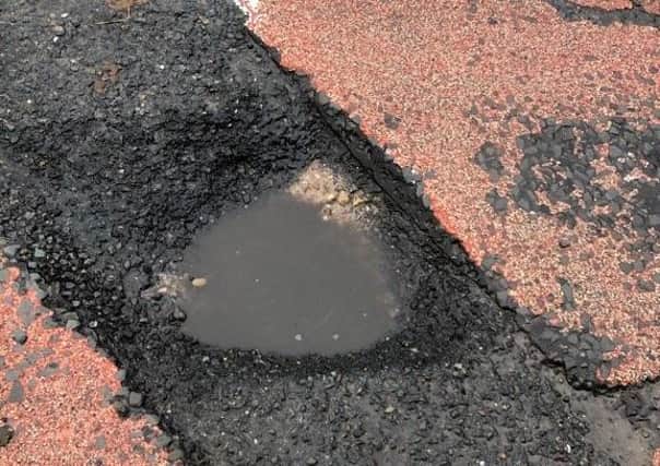 Just one of the pot holes reported by Coun Bunney using the FixMyStreet app