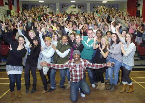 Haven High Technology College 10 years. Members of the ACM Gospel Choir are pictured at the front with director Mark DeLisser.