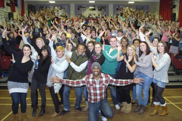 Haven High Technology College 10 years. Members of the ACM Gospel Choir are pictured at the front with director Mark DeLisser.