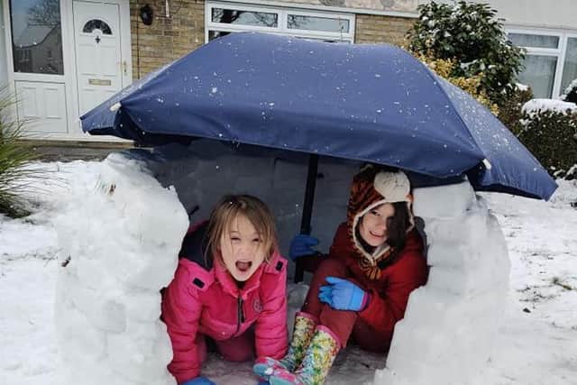 Jessica and Lexi in the finished igloo
