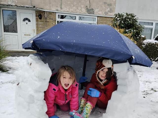 Jessica and Lexi in the finished igloo