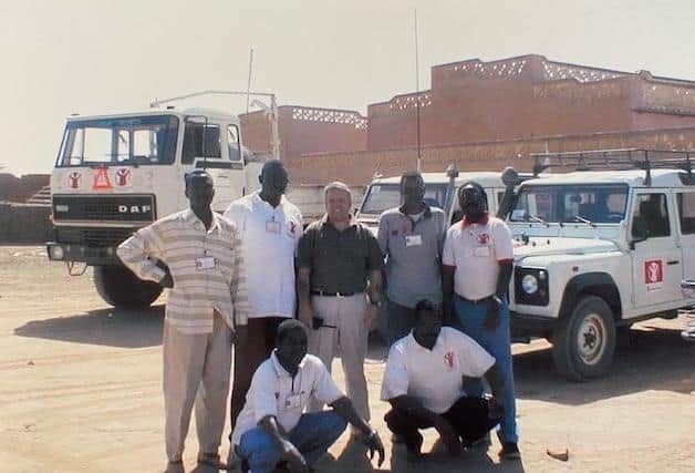 Phil getting the team ready to go to deliver aid in remote desert locations in Darfur, Sudan. EMN-210214-175702001