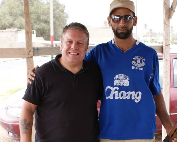 Phil at a road checkpoint in Libya manned by a friendly rebel faction. EMN-210214-175651001
