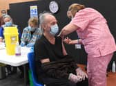 Covid-19 Mass Vaccination Centre at PRSA, Boston. John Lewis of Algarkirk receiving his vaccination EMN-210215-130350005