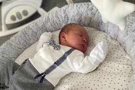 Charlie Smith's parents can't wait to tell the story of how he was born in a hotel car park.