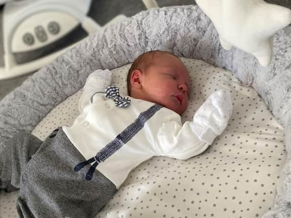 Charlie Smith's parents can't wait to tell the story of how he was born in a hotel car park.
