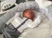 Charlie Smith's parents can't wait to tell the story of how he was born in a hotel car park.