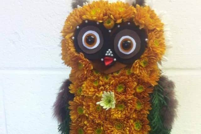 An owl tribute made by Kate Ladley of Softscape Florists in Louth