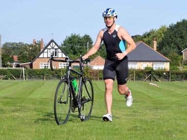 Chris Halligan says wearing a helmet saved his life.