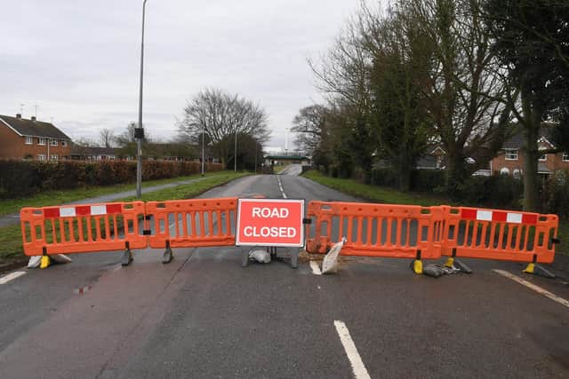 Railway bridge on Boston Road, Sleaford. Flood water drained away EMN-210222-143009001