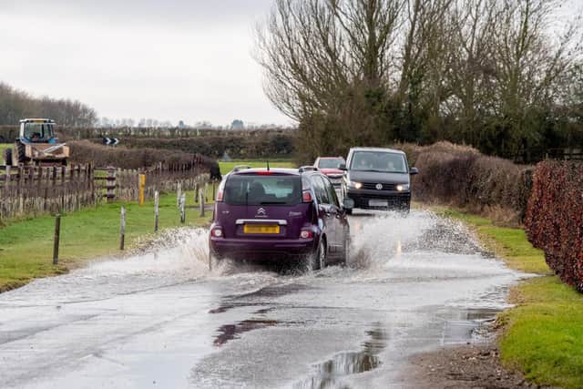 The flooded stretch of road in Mill Hill Way, South Cockerington. (Photos: John Aron)