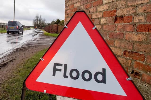 The flooded stretch of road in Mill Hill Way, South Cockerington. (Photos: John Aron)