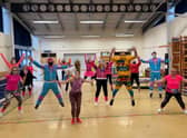 Brightly coloured Church lane School staff join in the Mr Motivator session. EMN-210103-104126001