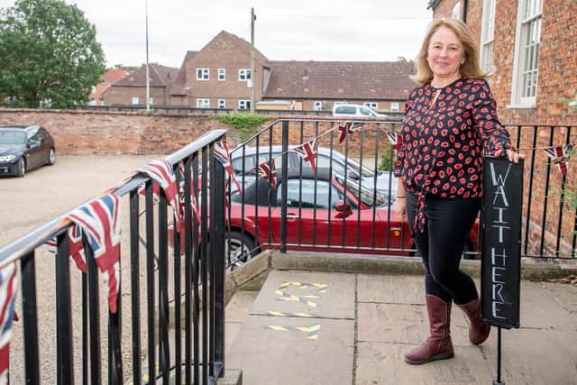 Jane Reed pictured outside School House Coffee Bar in July last year. Picture: John Aron. EMN-210224-163310001