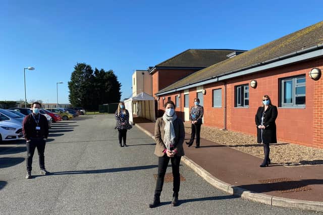 MP Victoria Atkins (centre) with staff at the Mablethorpe centre
