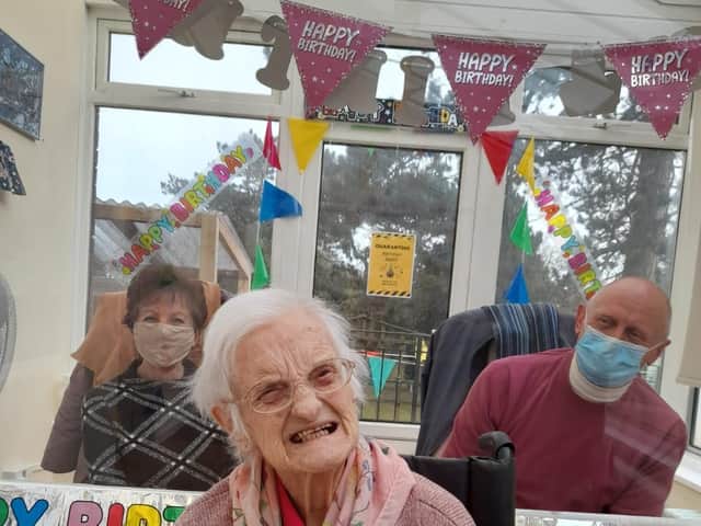Mary celebrating her 101st birthday with her son and daughter-in-law, Johnny and Susie Epton.
