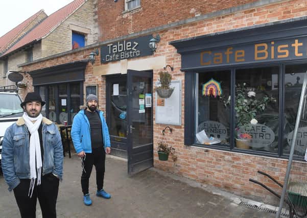 Building work at Tablez, Sleaford, to expand the cafe and create a roof terrace. Mesut Palabiyik (owner) and Ismail Uzkar. EMN-210103-123045001