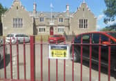 Waiting parents will be advised to wear masks and keep their distanced outside William Alvey School. EMN-210103-173215001