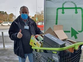 Bob Taylor of Boston Food Bank with the food donated