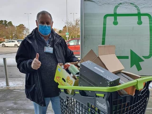 Bob Taylor of Boston Food Bank with the food donated