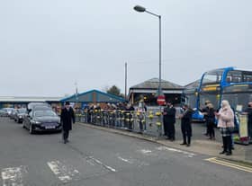 The funeral procession passes by the Stagecoach bus station. Photo: John Byford.