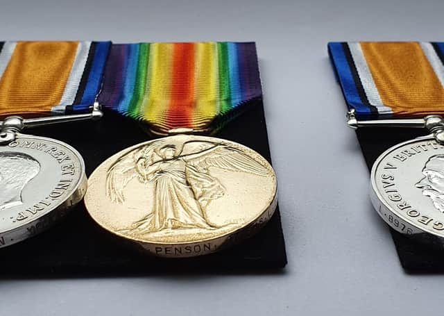 The medals of James and Charles Penson. EMN-210203-200038001