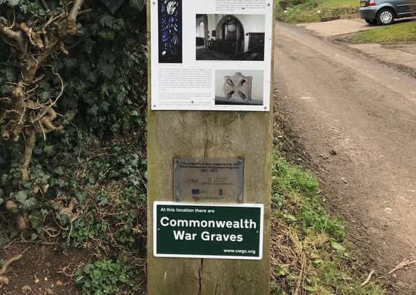 The new 'Commonwealth War Graves' sign.