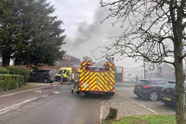 Smoke billows out of the burning factory. Photo: Russ Smith EMN-210503-095720001