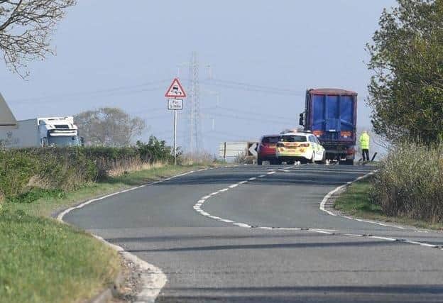 Emergency services at the scene of the collision last April. EMN-210503-154503001