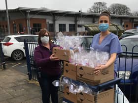 Jackie Hudson-Hay, of Kirton Holme, handing over the ‘pick me up’ packs to Nicola Hooker, a deputy sister on Pilgrim Hospital’s Intensive Care Unit.